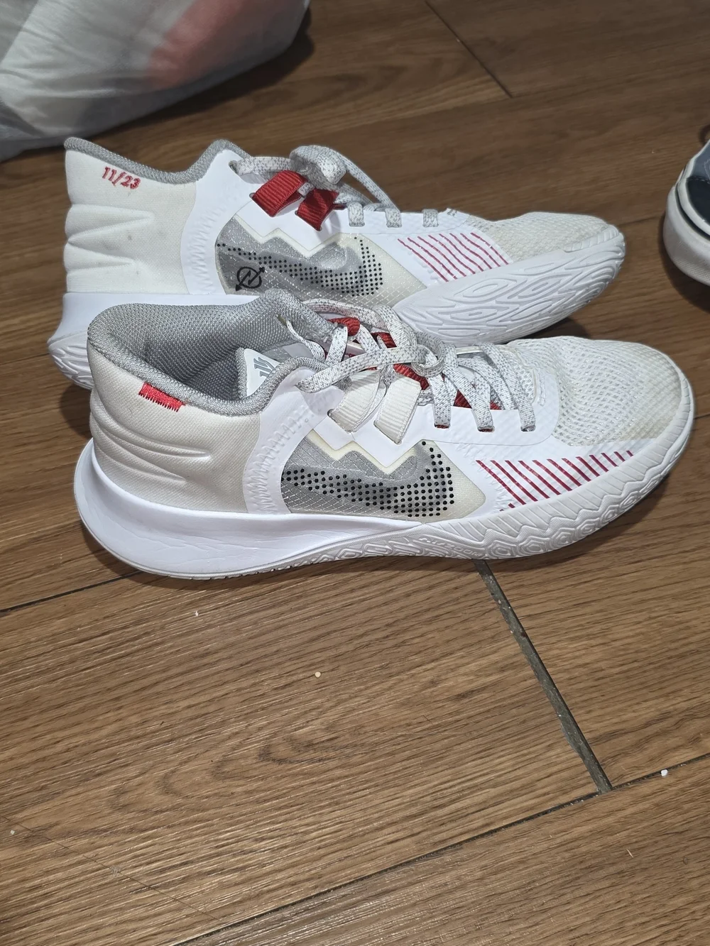 Nike White Sneakers with Red Accent